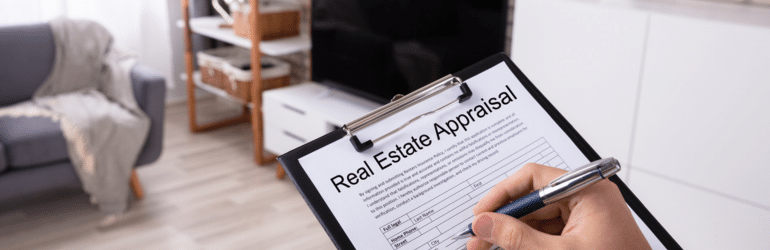 Man Filling Real Estate Appraisal Form