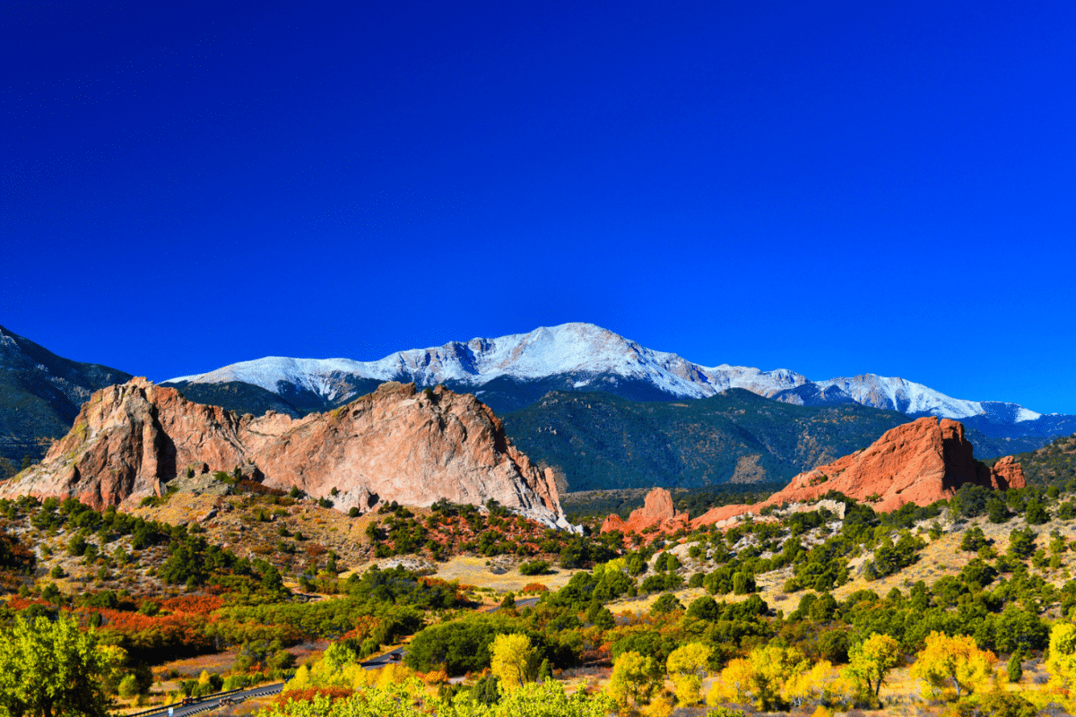 Snow capped Pikes Peak soaring over the Garden of the Gods Park in Colorado Springs